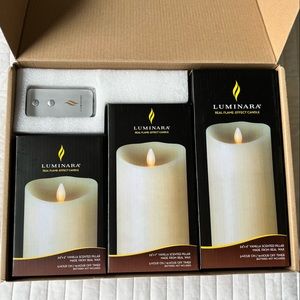 Three New Luminara Ivory Pillar Candles